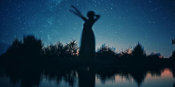 Calm landscape with still water reflecting the sky.